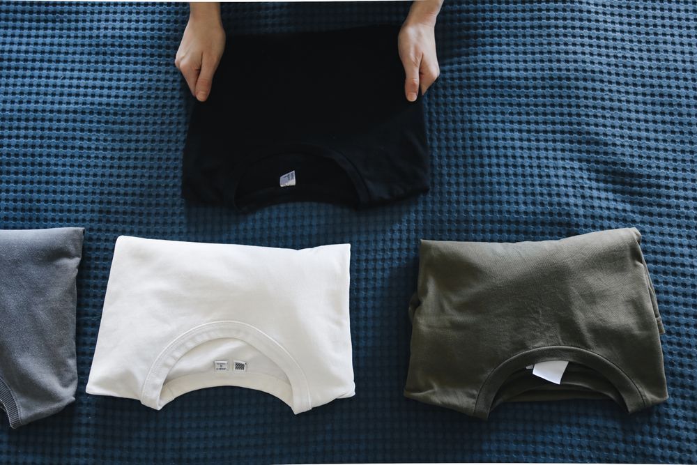 Neatly folded laundry and linens ready for a rental turnover