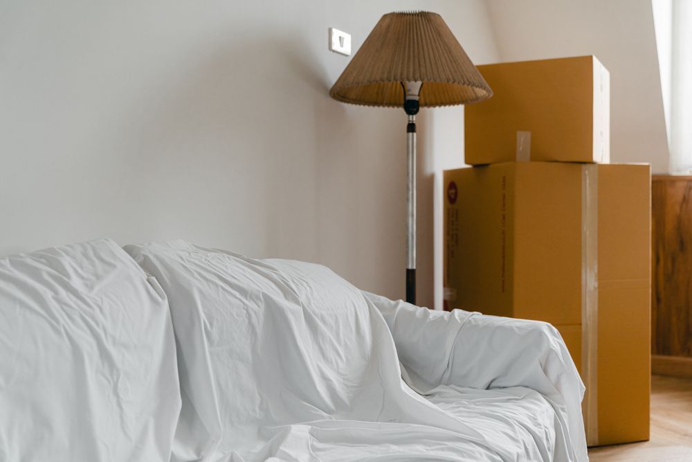 Bright empty apartment with moving boxes ready for move-in